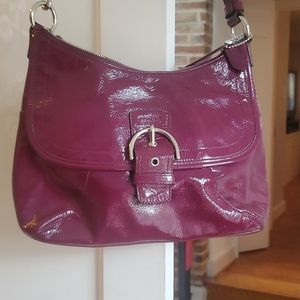 Purple Coach crossbody bag